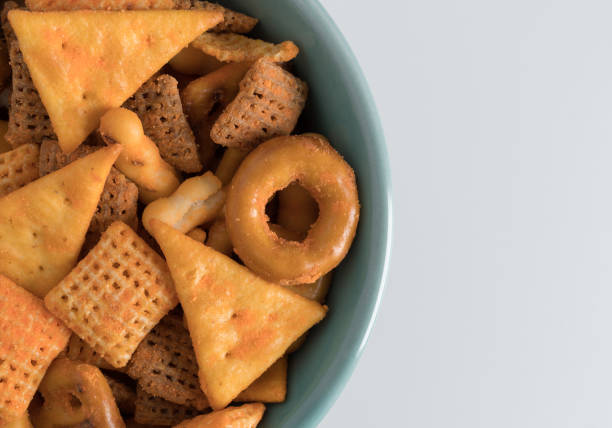 istock Snack crackers and pretzels in a small bowl 931207456