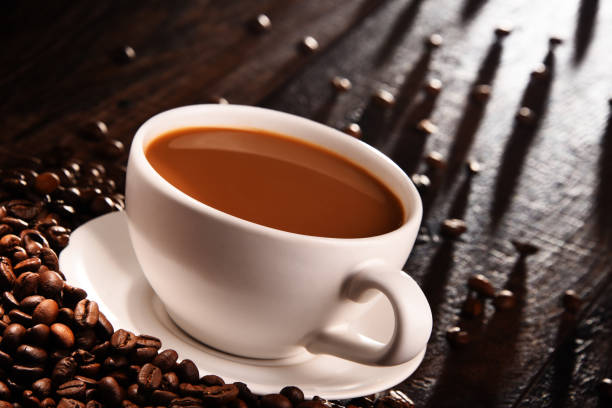 istock Composition with cup of coffee and beans 931209570