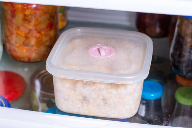 istock Meal prep in containers in the refrigerator ready to be frozen for later use. 931209696