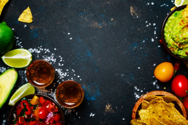 istock Tex-Mex Concept, Nachos, Guacamole, Salsa Sauce and Tequila 931212862