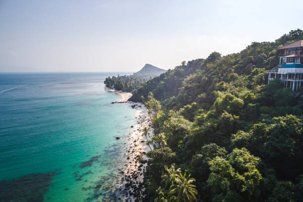 istock aerial drone flight over beautiful beach in thailand, koh samui 931213024