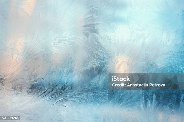 Colorful Frosty Pattern On The Window Stock Photo - Download Image Now - Ice, Winter, Backgrounds