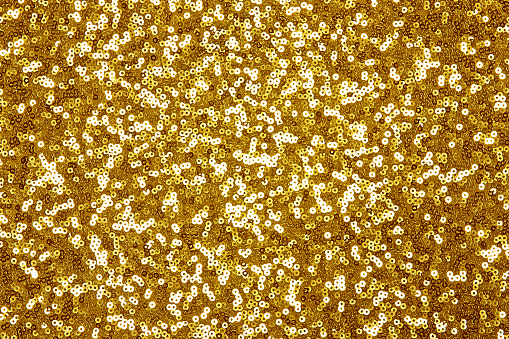 Background sequin. sequin BACKGROUND. glitter surfactant. Holiday abstract glitter background with blinking lights. Fabric sequins in bright colors. Fashion fabric glitter, sequins