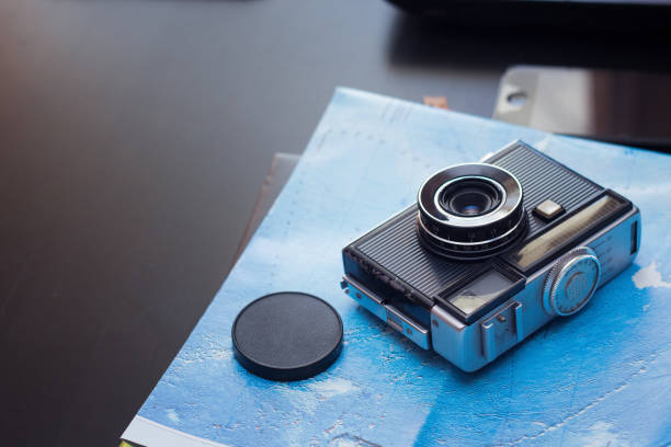 istock camera and travel map , travel concept 931226478