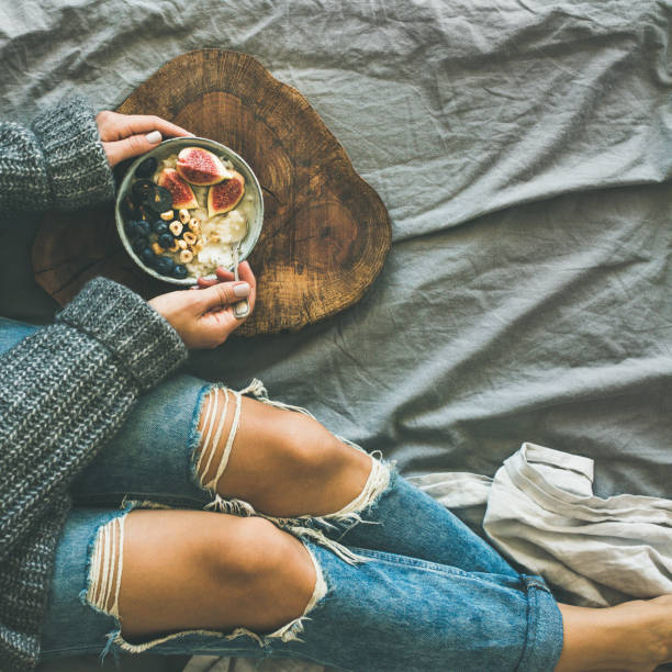 istock Healthy winter breakfast in bed concept, top view, square crop 931227874