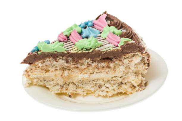 istock Meringue cake with nuts, decorated with colored flowers from cream 931230536