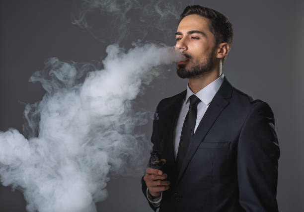 istock Handsome businessman in smoke cloud 931231822