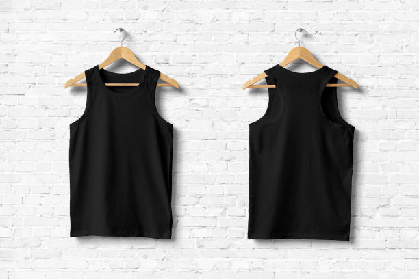istock Black Tank Top Shirt Mock-up hanging on white brick wall, front and rear side view. Ready to replace with your design. 3D rendering. 931239310