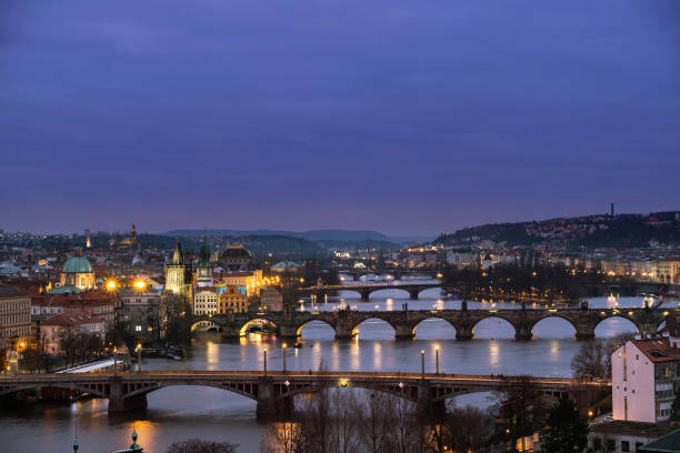 istock Beautiful view on the bridges over the river Vltava after sunset. 931243646
