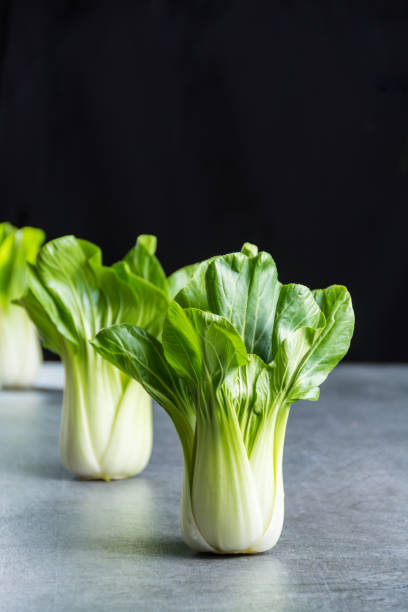 istock Fresh raw baby Bok choy or pak choi Chinese cabbage 931250012