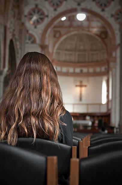 istock Praying in the church (Vertical) 93125219