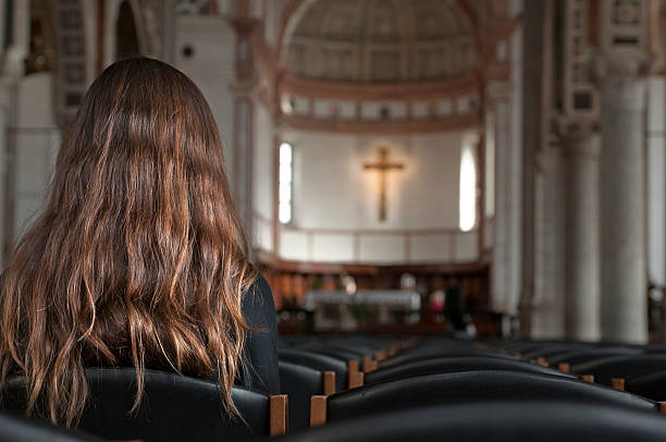 istock Praying in the church (Horizontal) 93125227