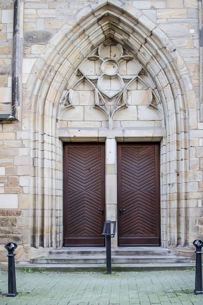 istock Wooden door on a building facade 931252764