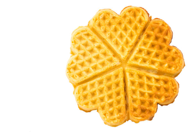 istock Freshly baked belgian waffles isolated on white background 931269450