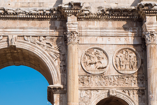 Detail of the Arch of Constantine near the Roman Colosseum, landmark and symbol of Rome, Italy