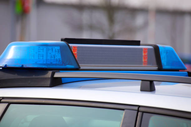 istock Blue light on a police car 931276618