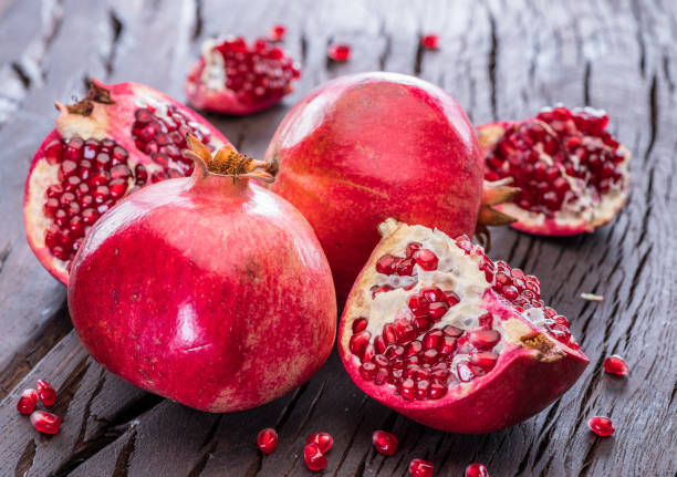 istock Ripe pomegranate fruits. 931281498
