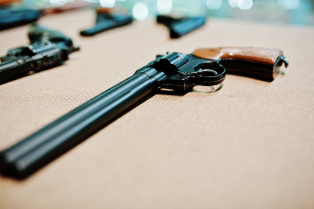 istock Close up revolvers guns on shooting range. 931282356