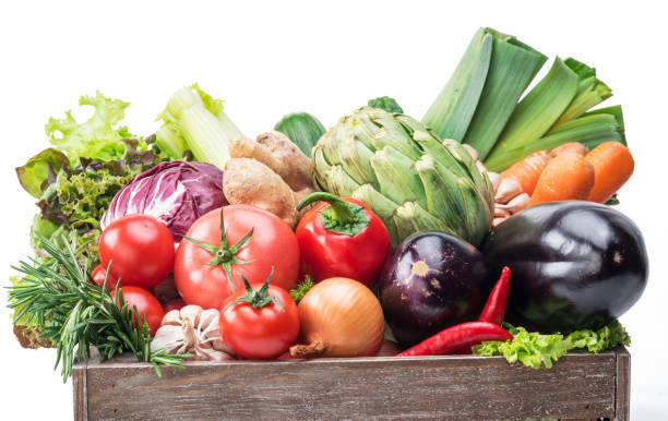 istock Fresh multi-colored vegetables in wooden crate. 931283480