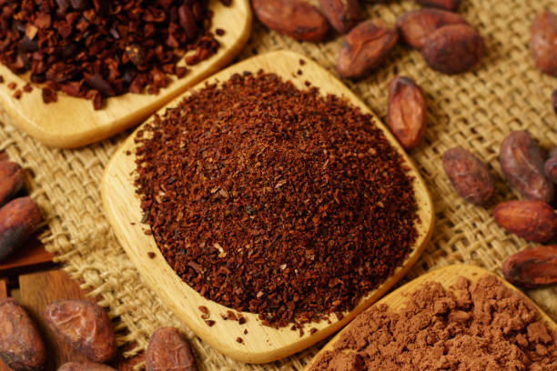 istock Cacao nibs, cacao powder and cocoa beans on burlap 931291904
