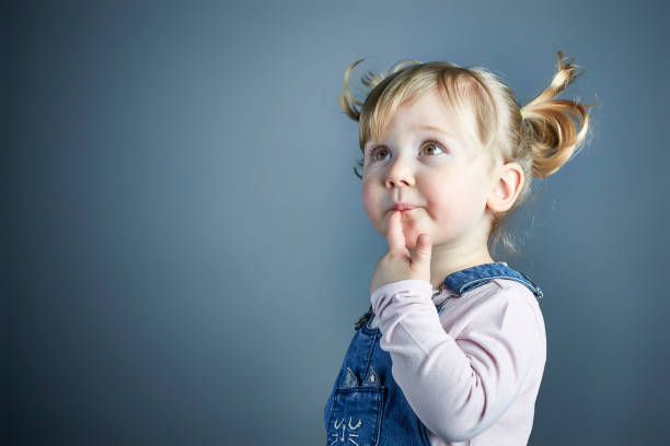 istock adorable female child studio shot 931298778