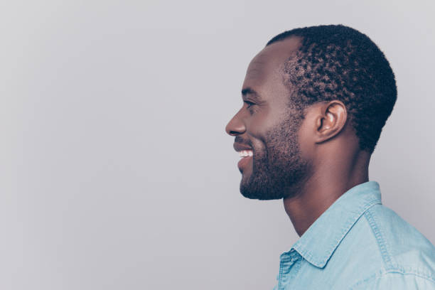 istock Profile, side view portrait with copy space, empty place for product of virile, smiling, manly, positive, cheerful man isolated on grey background 931309670