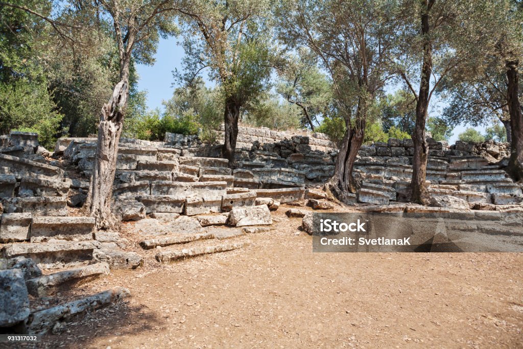 Ruins of the antique greek theater, Kedrai, Sedir island,Gulf of Gokova, Aegean Sea, Turkey Amphitheater Stock Photo