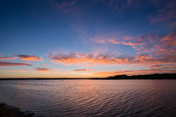 Sunrise over Petreborough beach stock photo