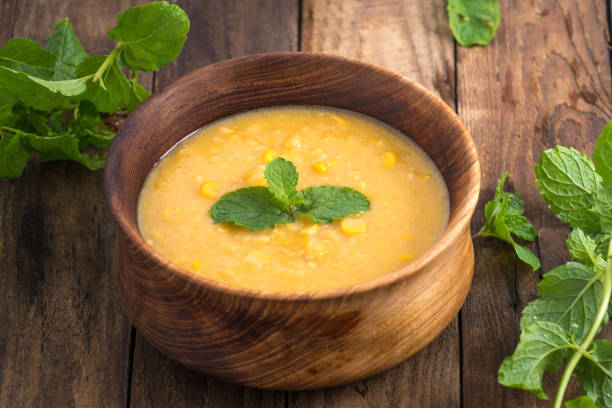 istock Corn soup in bowl and sweet corn on plate 931318972