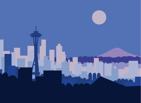 Seattle skyline and Mt Rainer against moonlit sky.