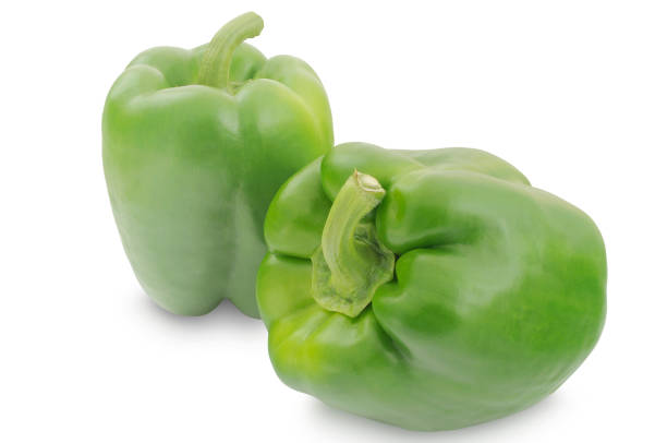 istock Two green peppers isolated on white background 931324196