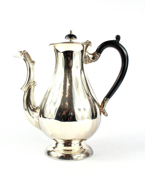 istock Silver Metal Ornate Tea Pot on Background 931325342