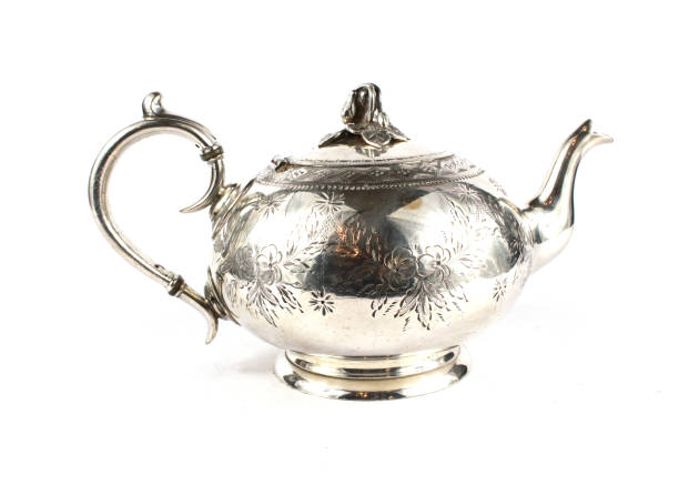 istock Silver Metal Ornate Tea Pot on Background 931326236
