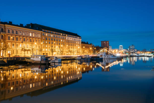istock Reflection Of Buildings In Water 931338134