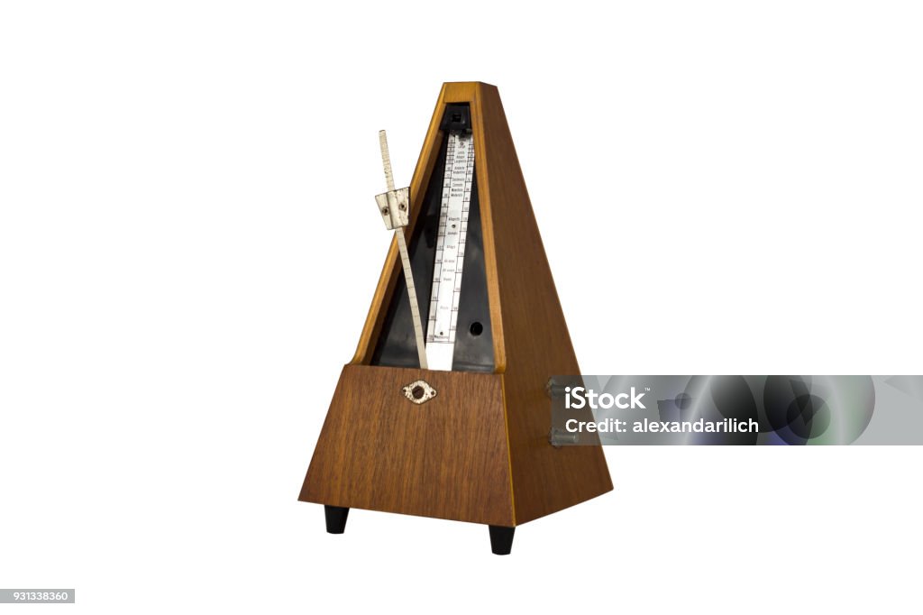 Vintage Metronome Isolated On White Background. Musical Equipment Metronome Stock Photo