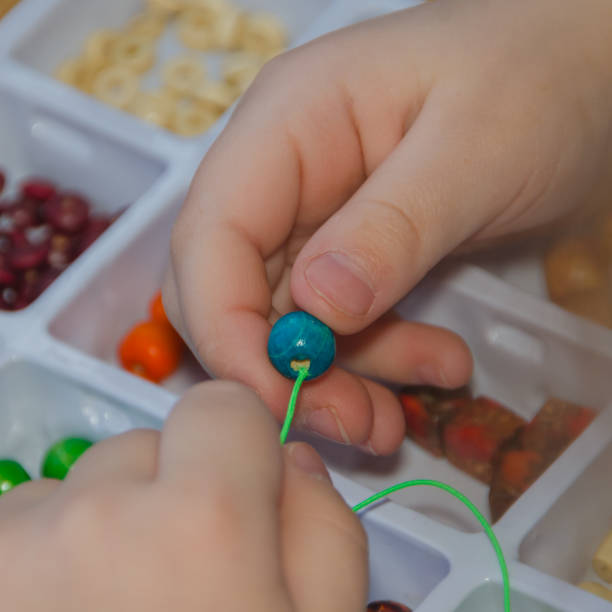 istock closeup of a child bracelet set beads 931342094