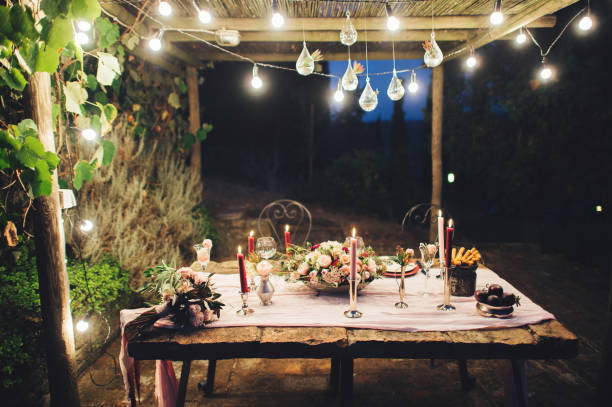 istock Decorated outdoor wedding table with flowers in rustic style 931347218