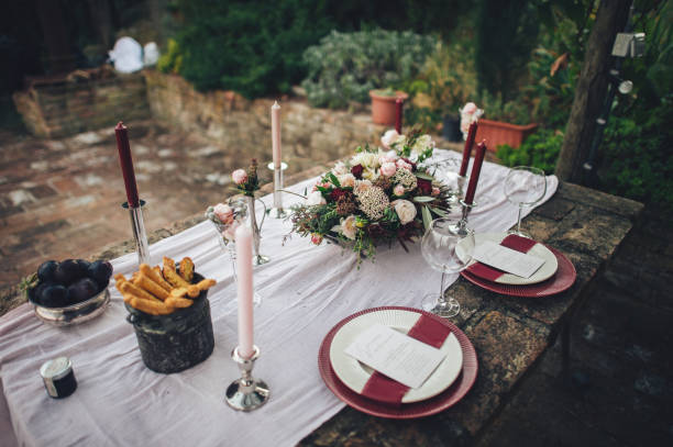 istock Decorated outdoor wedding table with flowers in rustic style 931347336
