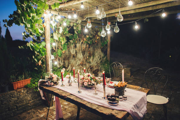 istock Decorated outdoor wedding table with flowers in rustic style 931347378