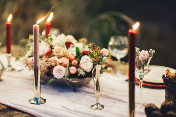 istock Decorated outdoor wedding table with flowers in rustic style 931347500