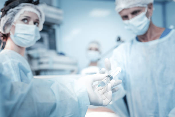 istock Medical helpful syringe going to a medic. 931351266