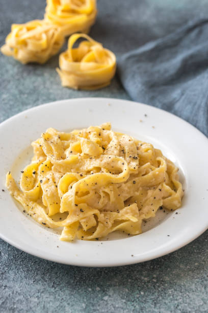 istock Portion of fettuccine Alfredo 931352612