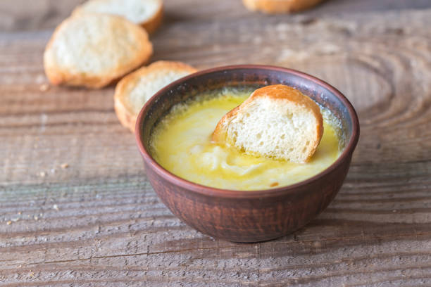 istock Bowl of cheese dip with toasts 931353166