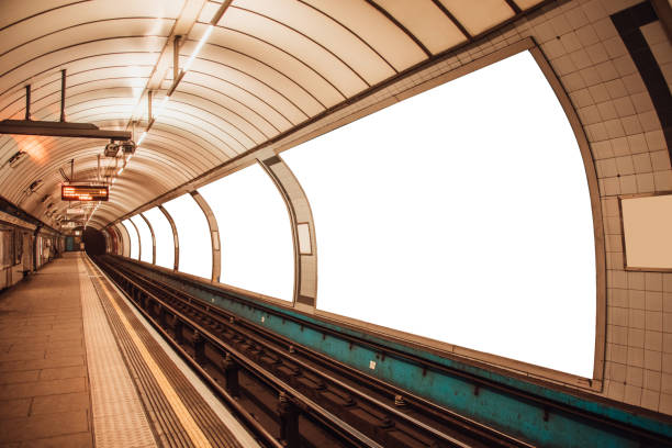 billboards at london underground station - afixar cartaz imagens e fotografias de stock