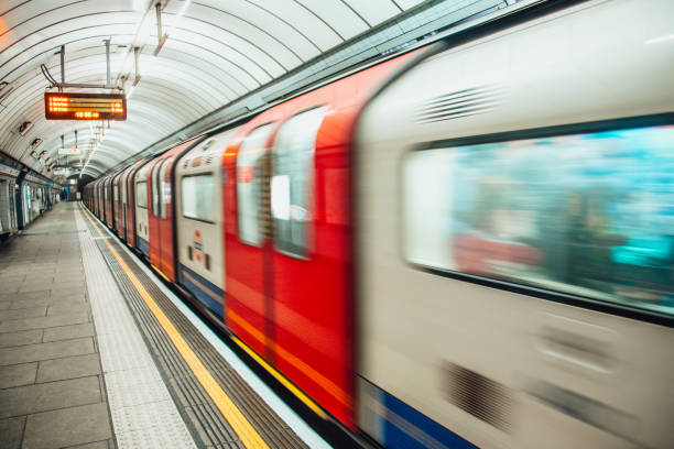 london underground train in motion - tower hamlets imagens e fotografias de stock