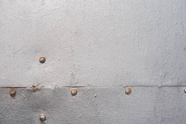 istock Antique metal iron surface with rivets - grunge background, texture 931354040