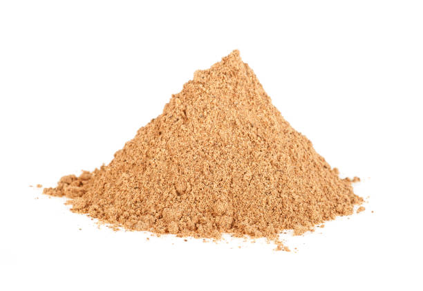 istock Pile of cinnamon powder isolated on white background 931356866