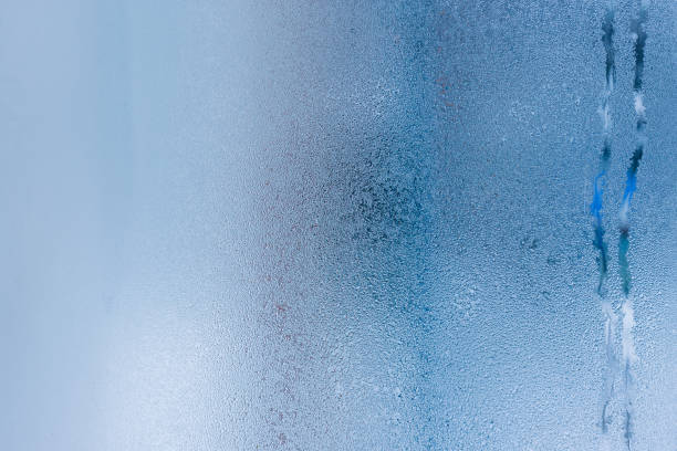 istock Window condensate or steam after rain, large texture or background 931363160