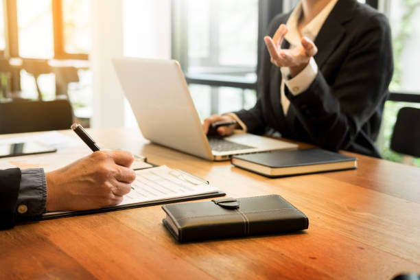 istock Midsection Of Businesspeople Working At Table In Office 931376316