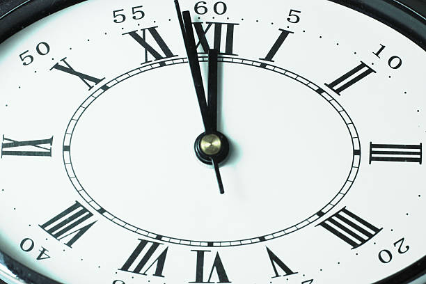 istock Close-up of clock Reaching 12.00 93138190